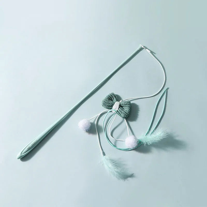 Blue cat teaser toy with long pole and feather attachments for interactive play
