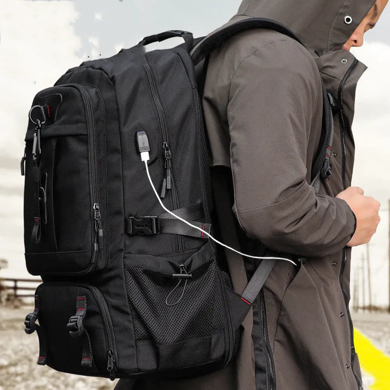 Black oxford cloth large capacity travel backpack with USB port and anti-theft design, showing front view with multiple compartments