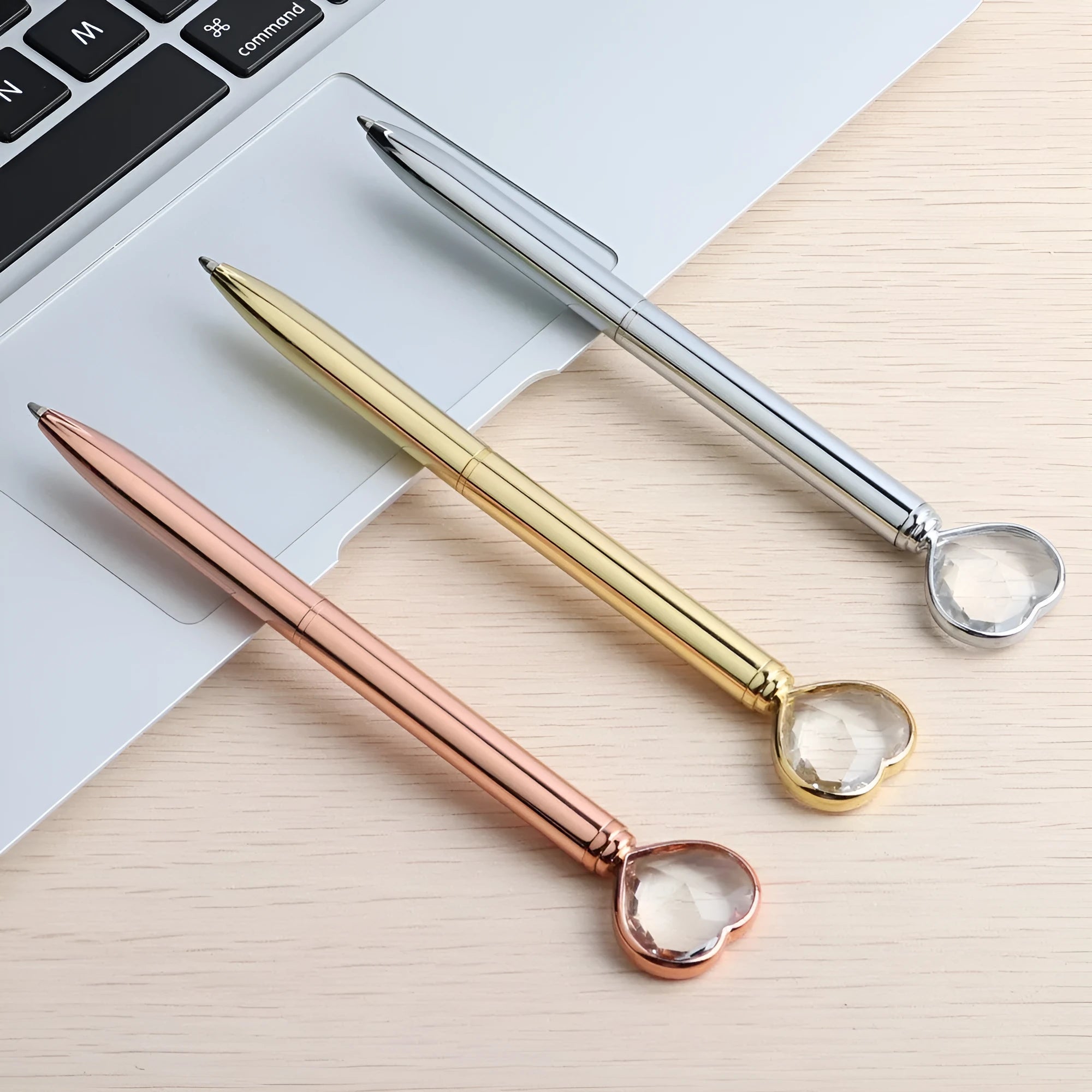 Creative Crystal Love Ball Diamond Metal Pen in golden, rose gold, and silver finishes showing decorative pattern