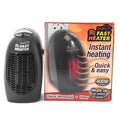 Black portable ceramic electric heater with digital display and rotating plug on a white background.