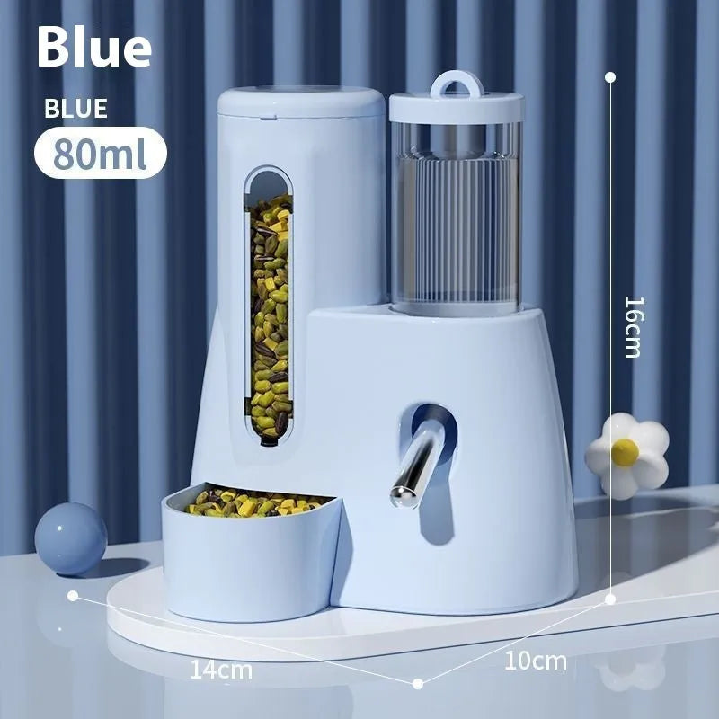 White, blue, and pink automatic hamster water feeder with attached food basin.