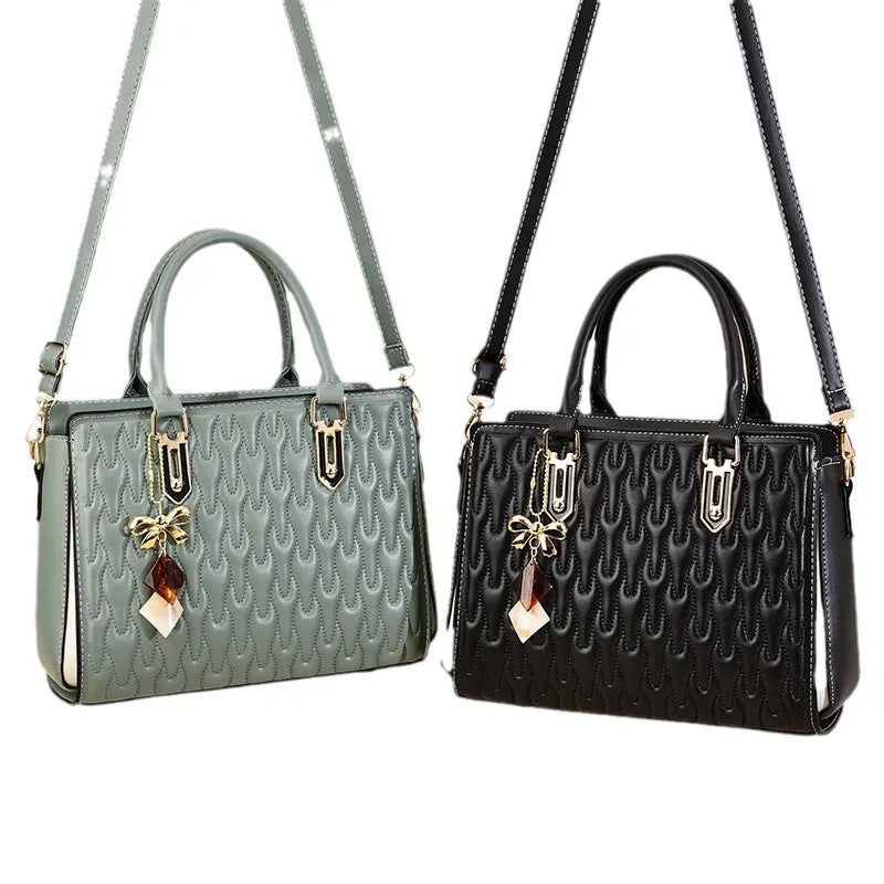 Women's large-capacity polyester messenger bag in black, showing outer pocket design.