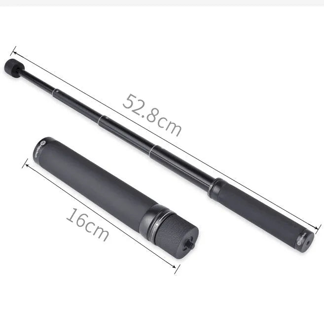 Black retractable aluminium selfie stick with Bluetooth remote, extended with a phone in the holder.