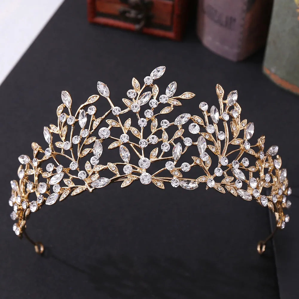 Vintage rhinestone crown headdress in alloy, 15 x 6.5cm, with green phantom quartz crystal and electroplated finish.