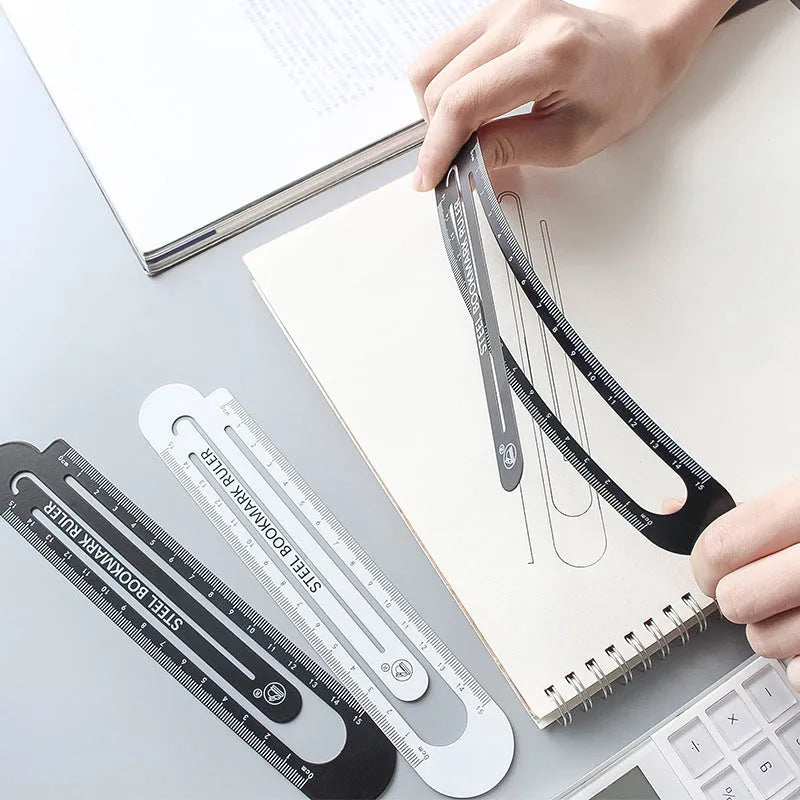 Black and white two-sided metal ruler showing 12 cm length scale.