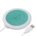USB-powered insulated heating coaster for mugs in black, blue and orange colours