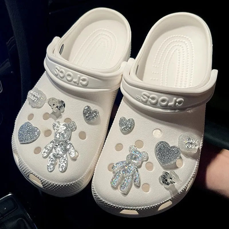 Crystal cloud bear shoe buckle set with resin, plush, and plastic details on a white background