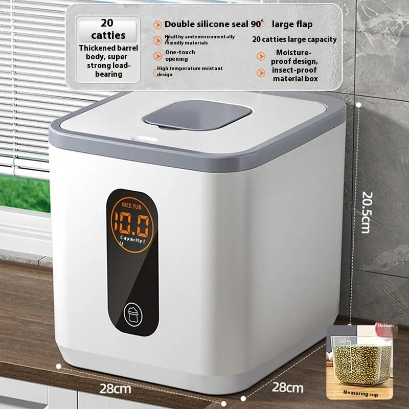 Simple grey plastic sealed rice storage jar with a measuring cup on a kitchen counter.