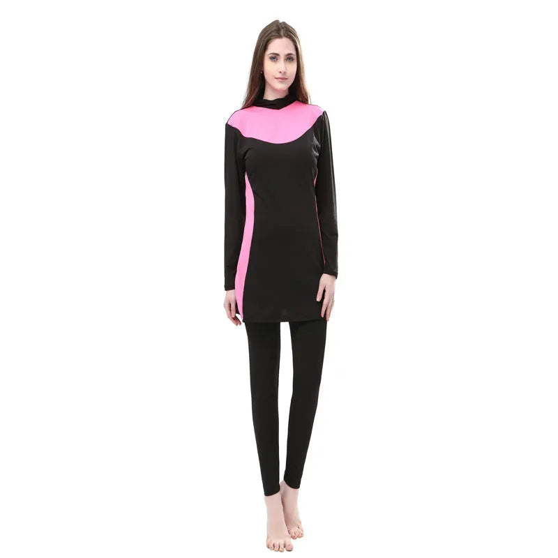 Conservative black and rose red women's swimsuit set with long sleeves, hood, and trousers.