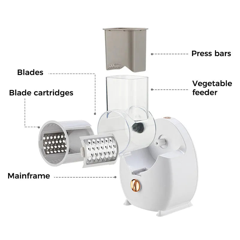 White electric vegetable slicer with rotary grater, suction base, and set of three blade pairs on a kitchen worktop.
