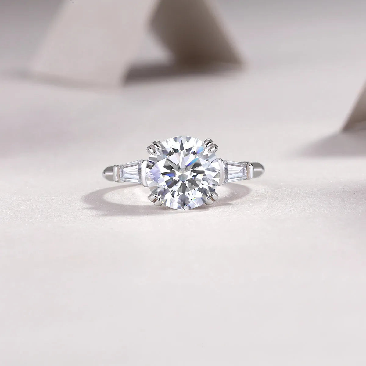 3-carat octagonal moissanite wedding ring set in S925 silver with platinum plating on white background