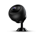 White or black 1080p wireless WiFi security camera with wide-angle lens on a desktop.