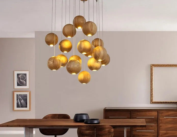 Nordic solid wood ball pendant chandelier with an adjustable cord hanging from a wooden disc.