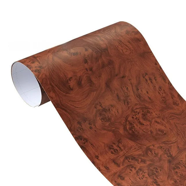 Roll of matte wood grain PVC vinyl wrap film for car colour change and customisation.