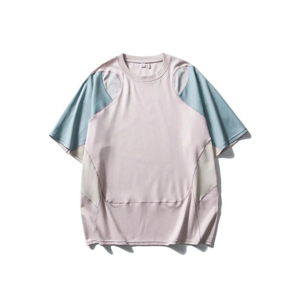 Men's loose fit patchwork t-shirt in blue or beige with short raglan sleeves.