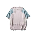 Men's loose fit patchwork t-shirt in blue or beige with short raglan sleeves.