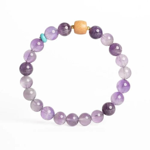 Handmade purple amethyst crystal bracelet for women, showing 6mm and 8mm bead size options.
