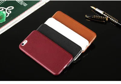 Genuine leather phone case for Apple iPhone in black, shown fitted to an iPhone 11 model.