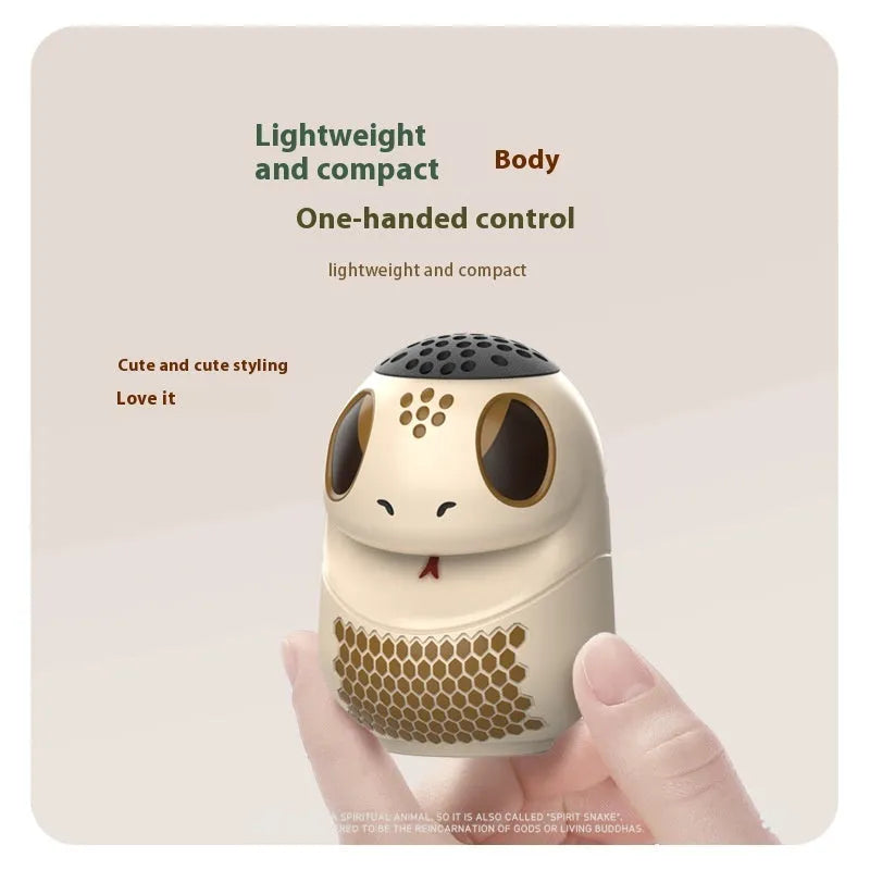 TK900 white cartoon-themed portable Bluetooth speaker with card insertion slot and LED lighting