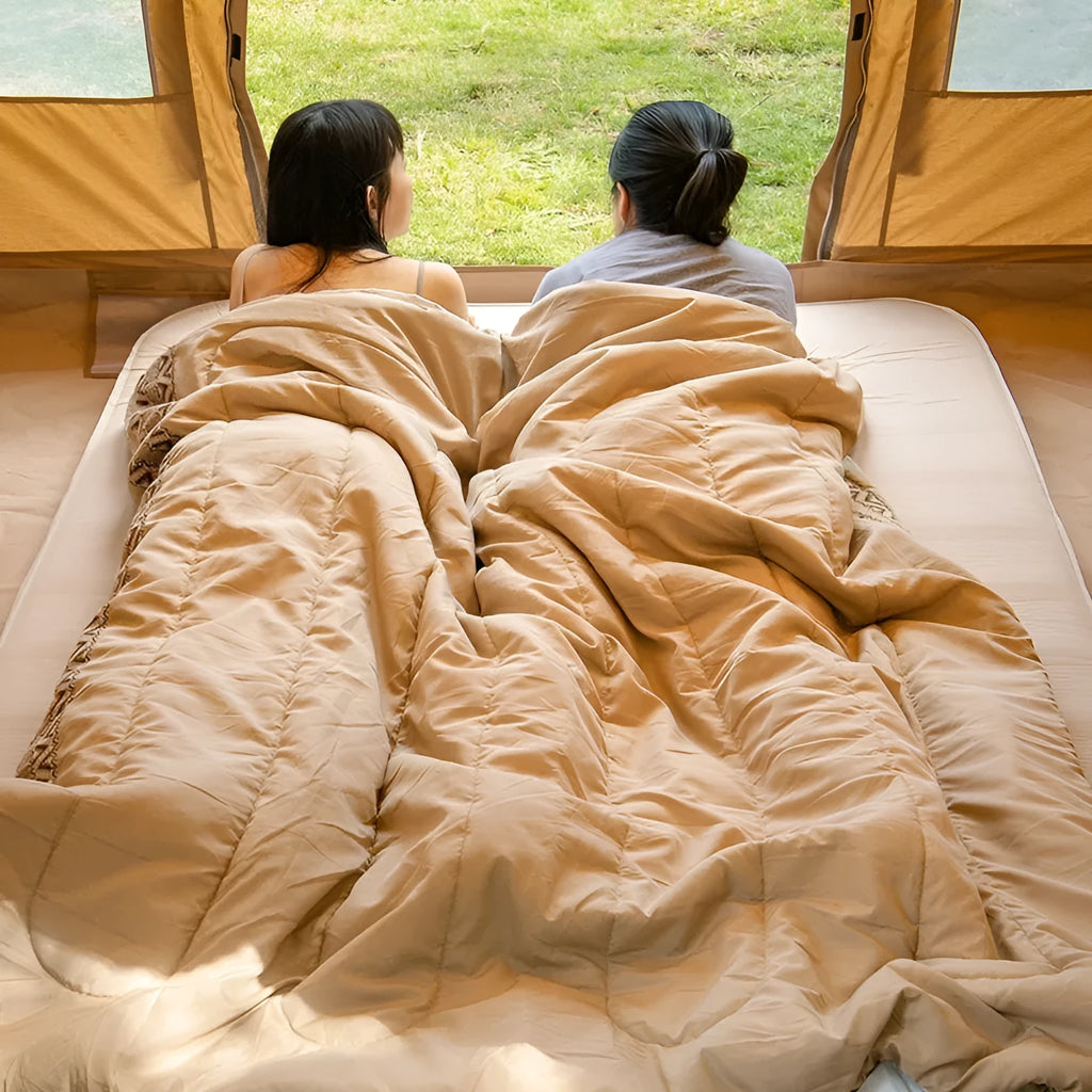 Four Seasons universal portable outdoor camping sleeping bag in swamp colour, shown with storage bag