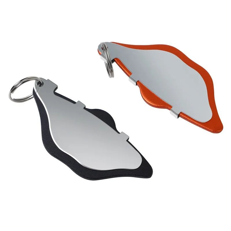 Mountain bike disc brake pads in black and orange with scratch-proof design