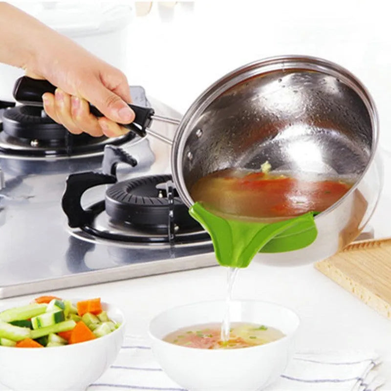 Green silicone kitchen funnel with clamp for round pots showing 12cm measurement