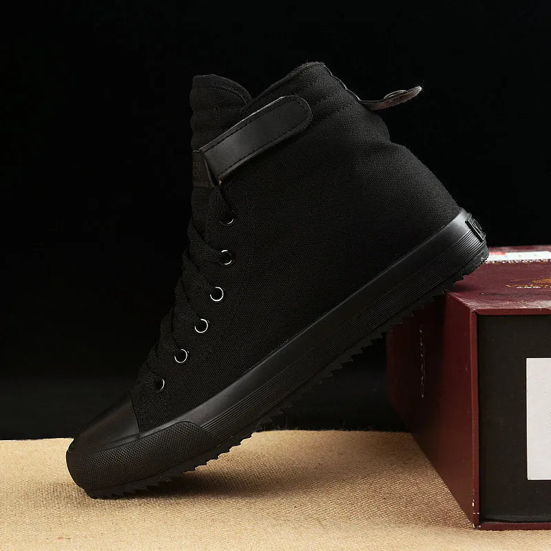 Velcro student canvas shoes high top with canvas upper, rubber vulcanised sole, round toe, and flat heel in black, grey or red and white.