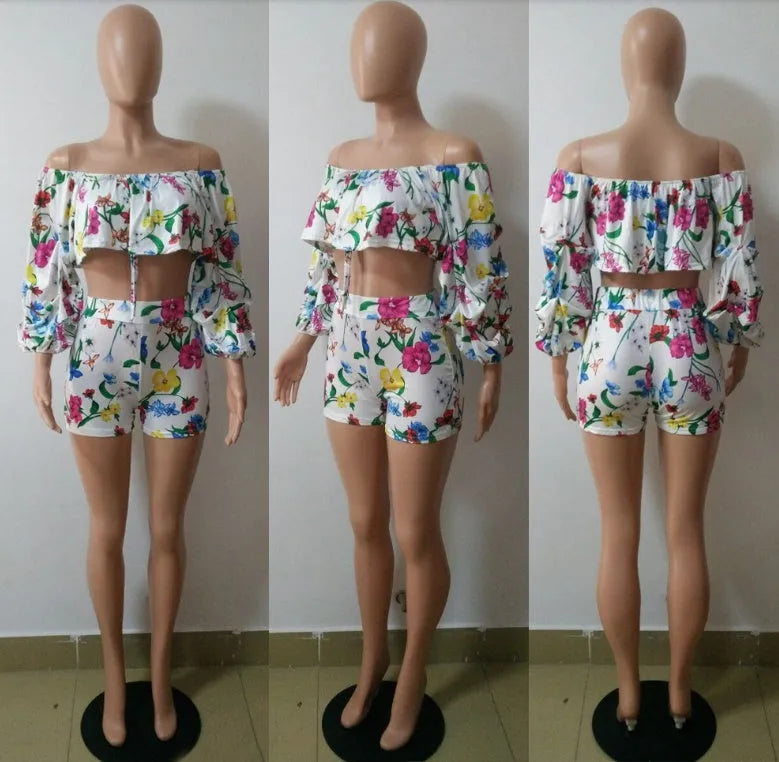 Multicolour digital print women's two-piece tracksuit with pile sleeves on the short top and matching shorts.