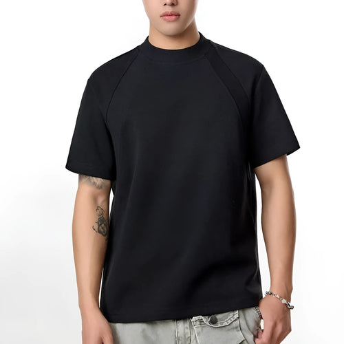 Loose fit short sleeve polyester top in black, shown on a model