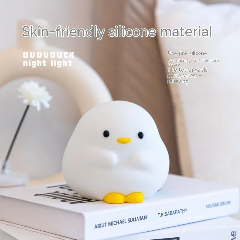 Cute duck LED night lamp in silicone with USB charging, touch sensor, and 125mm x 105mm x 110mm size