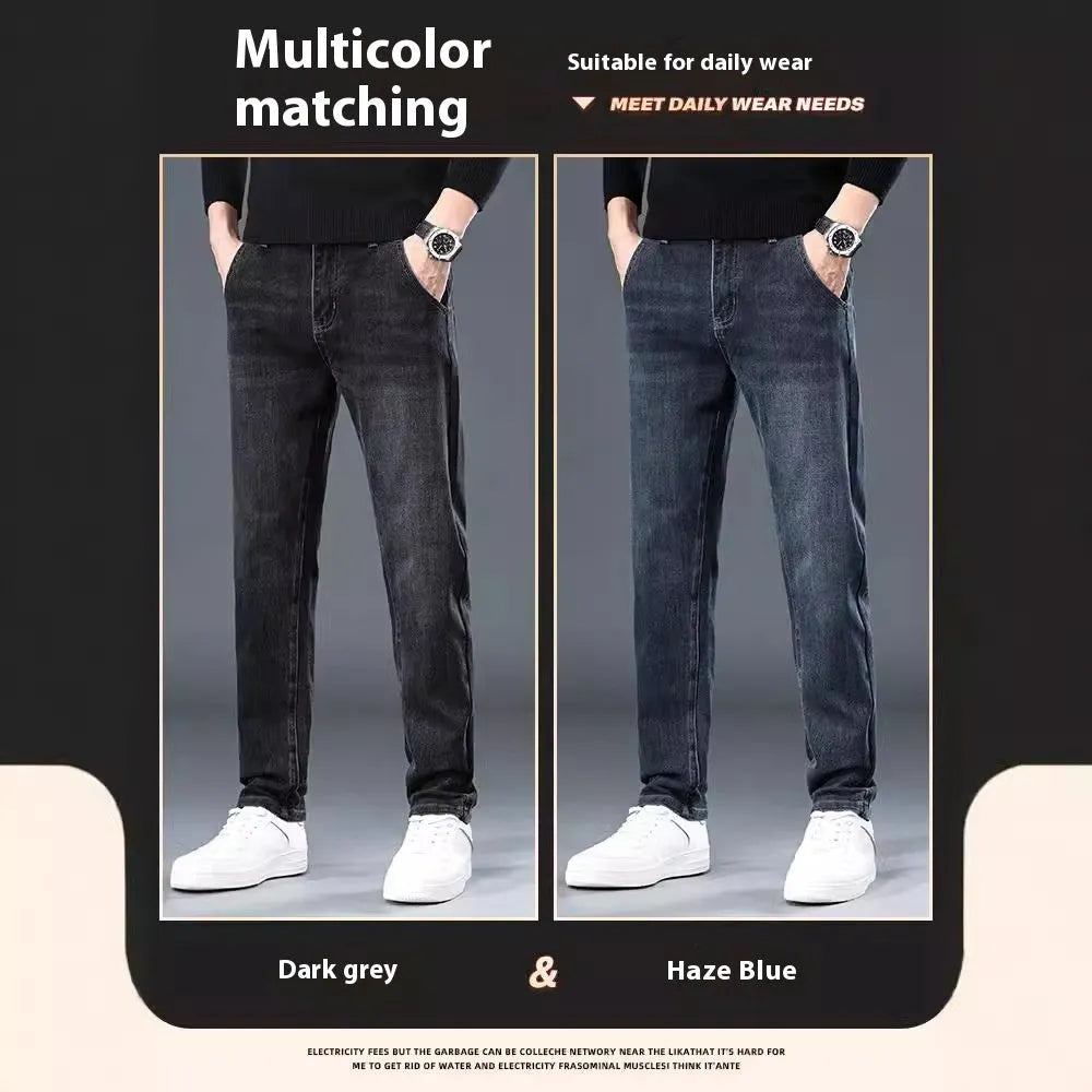 Man wearing slim straight blue grey casual trousers with a zipper fly and mid waist.