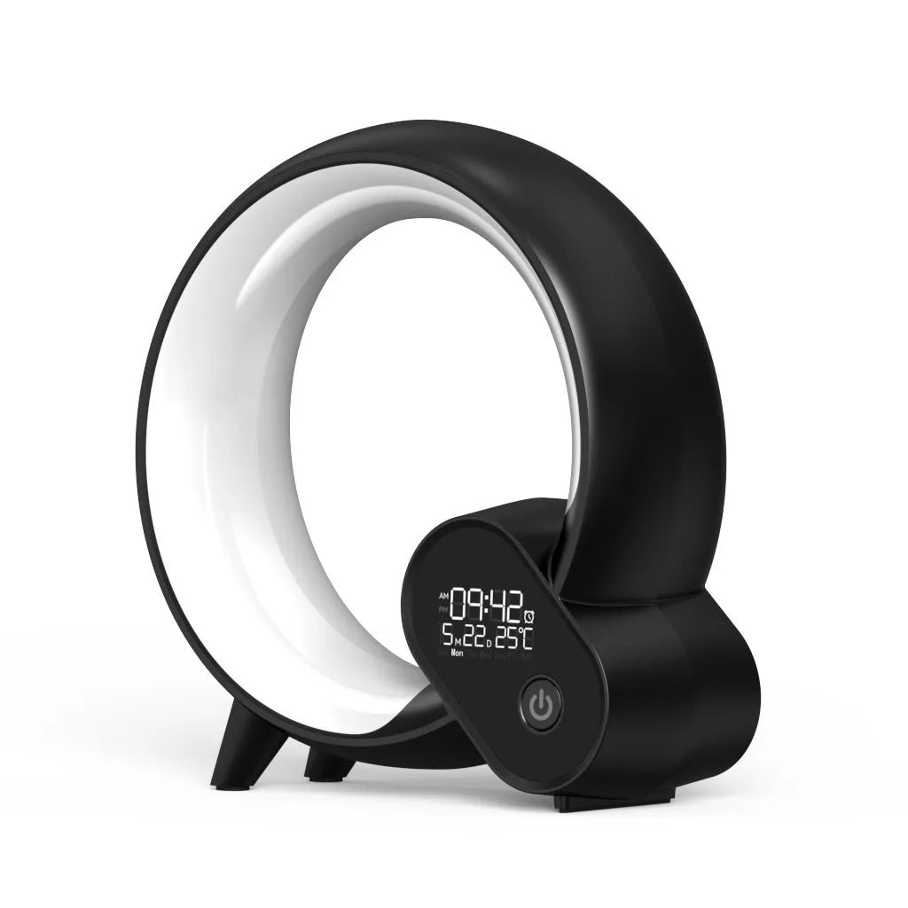 Creative Q modern digital alarm clock with colourful LED light ring in black or white finish.