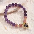 Women's retro bracelet with asterism juyun stone beads and a silver peace buckle clasp.