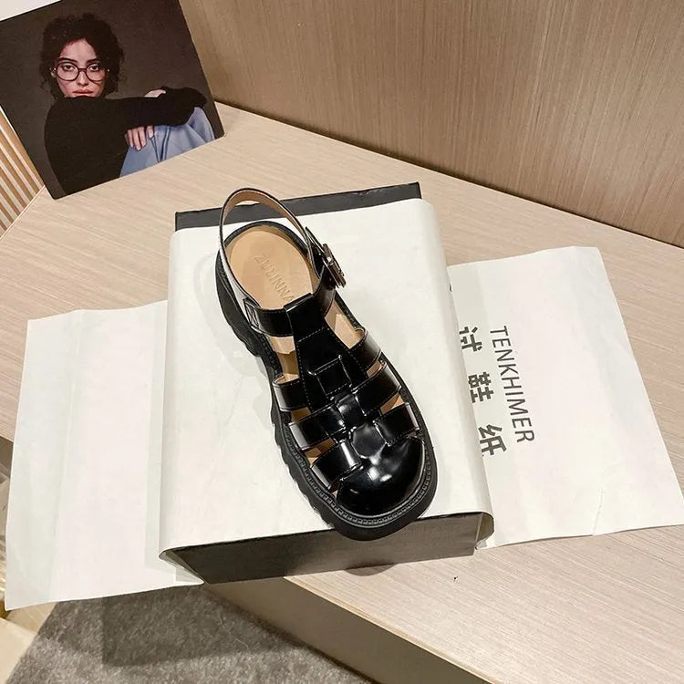 Women's black platform sandals with buckle closure and chunky hollow sole