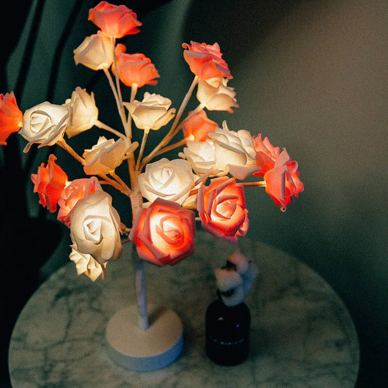 White and red PE cotton rose flower lamp with warm white LED lights on a table, with battery and USB power options.