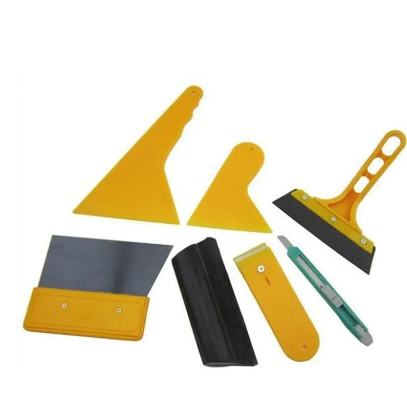 Seven-piece car film application tool set with scrapers, knives, and a pressing block.
