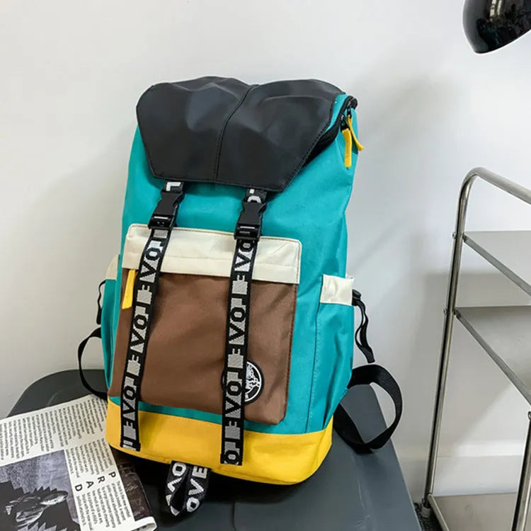 Oxford cloth backpack in black, green, or red, showing handheld and shoulder strap carry options