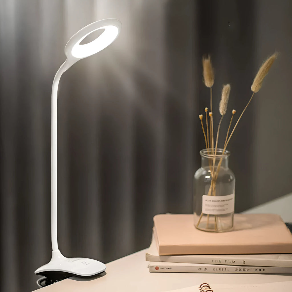 Green USB rechargeable touch table lamp on a wooden surface.