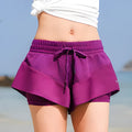 Purple quick-drying nylon sports shorts for running, fitness and dance, available in sizes S to XL