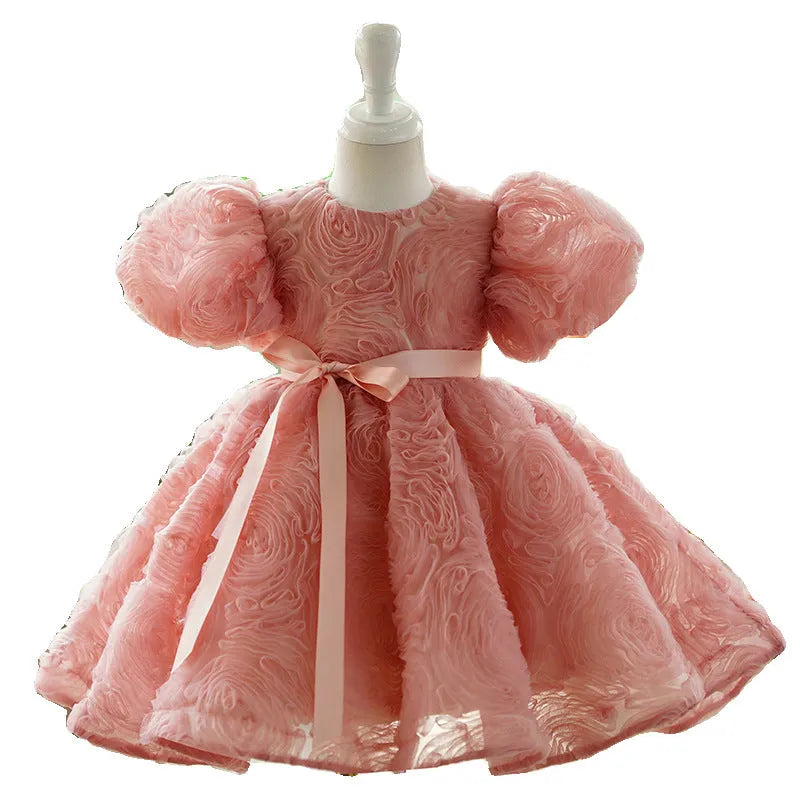 Children's girls' bean pink polyester pettiskirt birthday dress with lining, side view