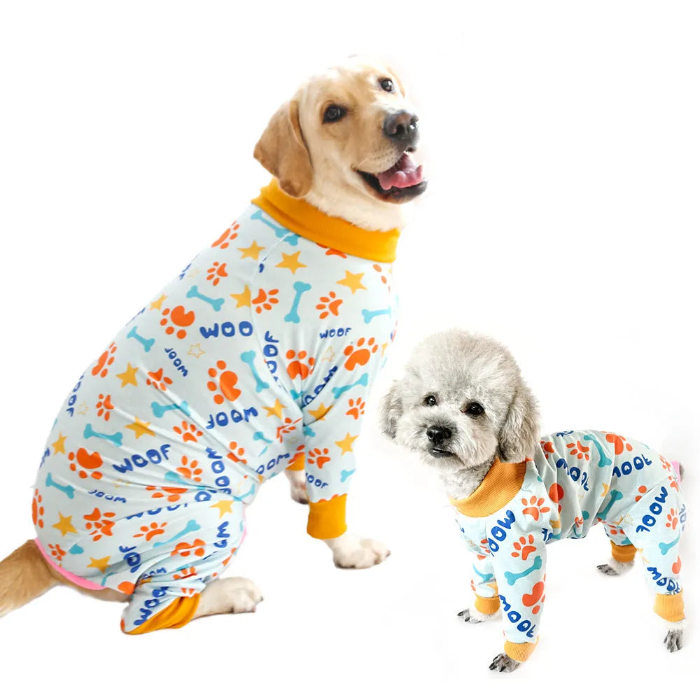 Cotton four-legged dog jumpsuit with colourful print design, shown on a small dog.