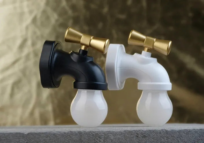 Black and white faucet-shaped USB rechargeable night lamp with sound activation feature