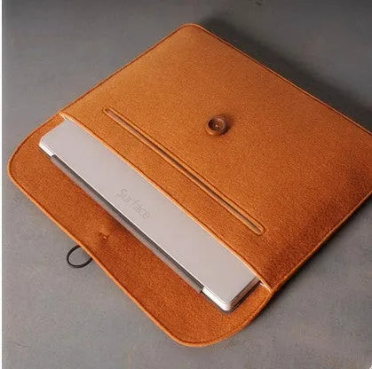 Orange felt laptop bag compatible with MacBook and tablet computers, open to show padded interior