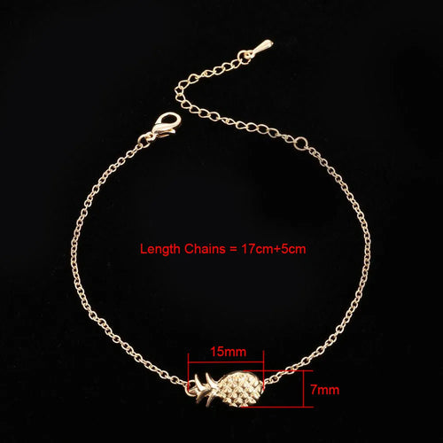 Close-up of a women's alloy bracelet featuring a detailed pineapple charm in gold or silver colour.