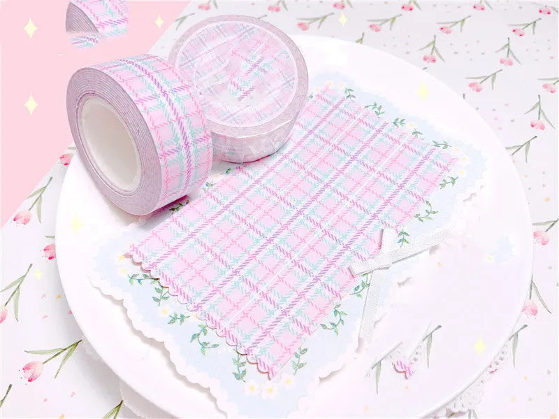 Eight rolls of decorative plaid paper tape in blue green pink purple and yellow with release paper backing 2cm x 10M