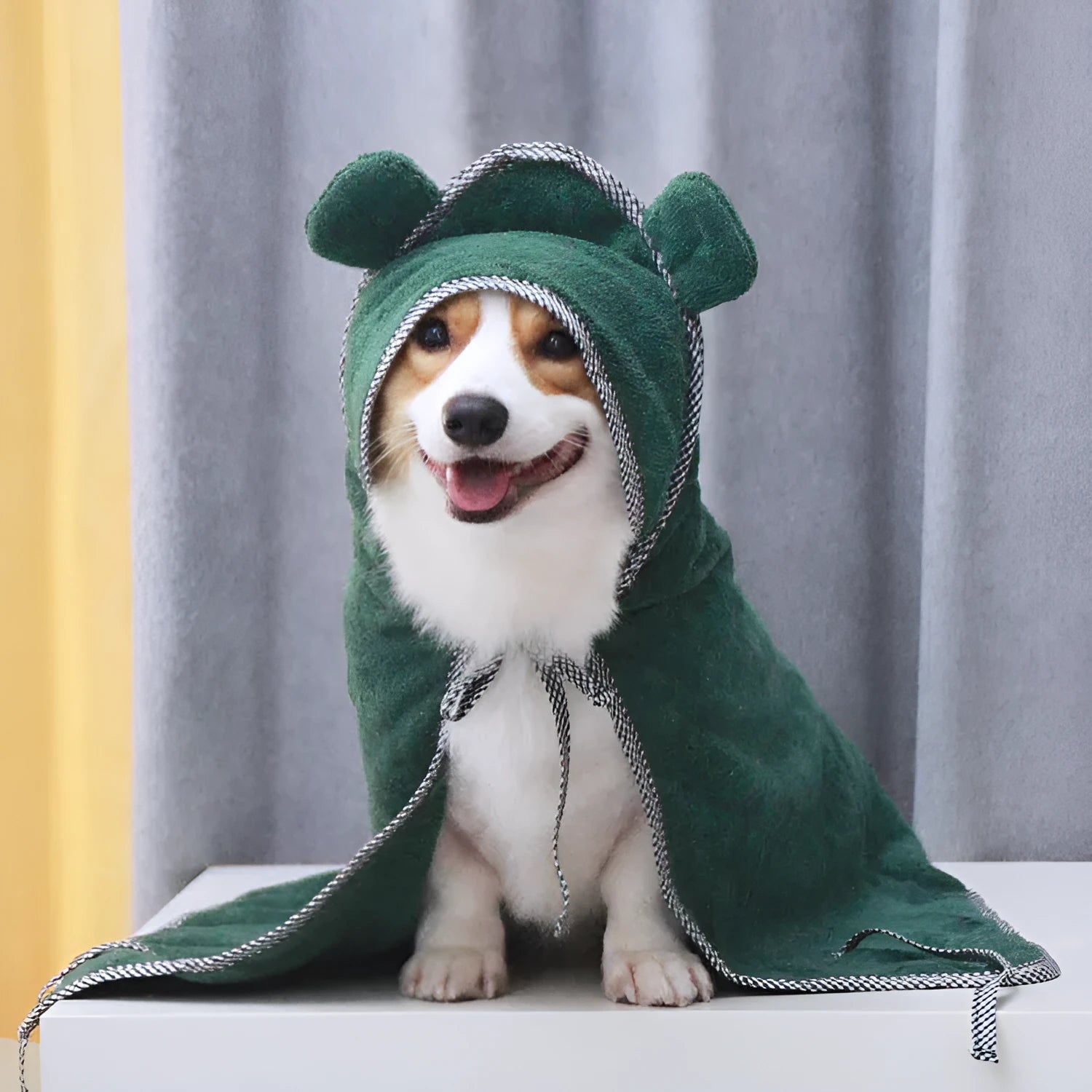 Grey and green ultra-fine fibre pet towels for dogs and cats in three different sizes.