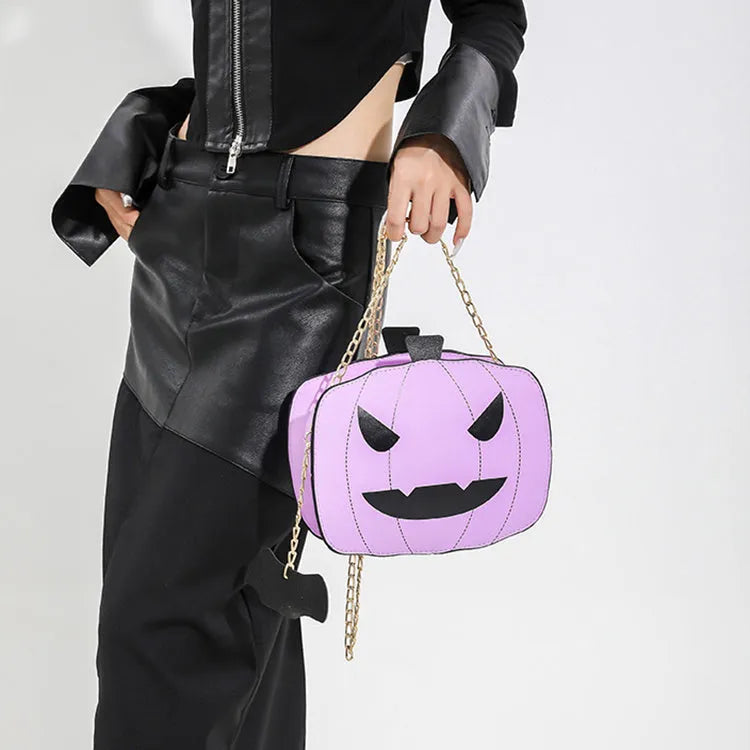 Halloween cartoon pumpkin shoulder bag for girls in colour options with chain crossbody strap on white background