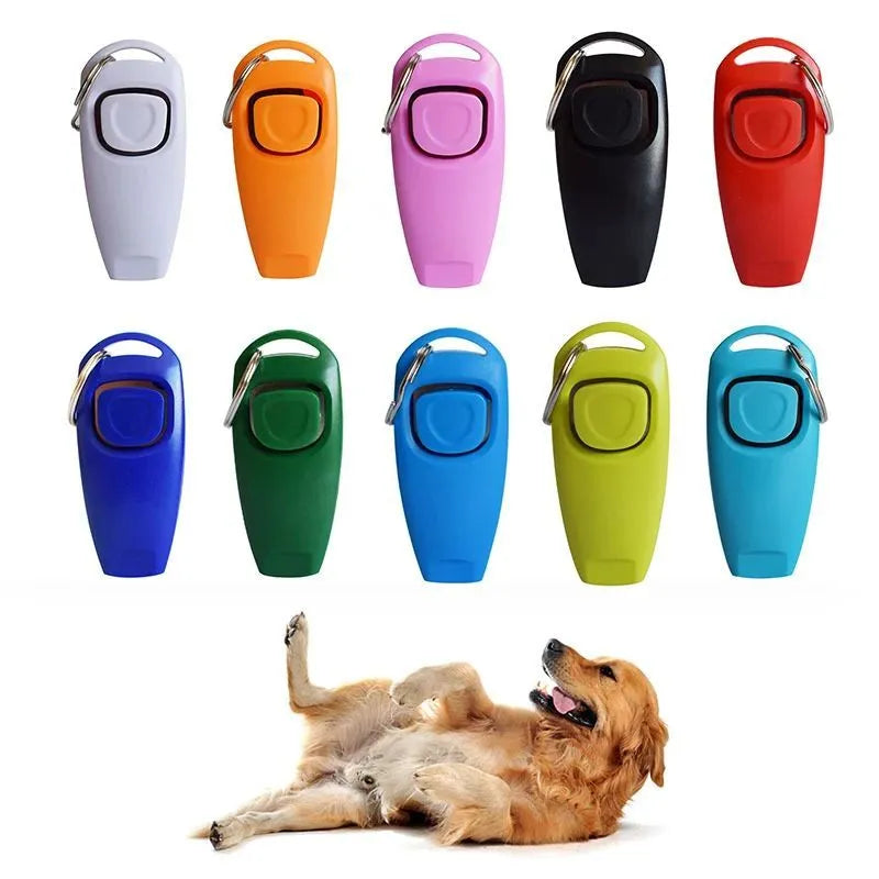 Colourful plastic dog training clicker with whistle and key ring on a white background.