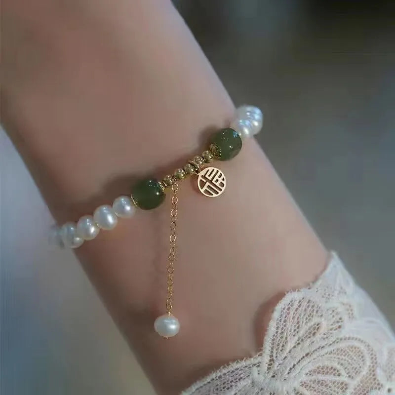 Chinese style glass bracelet with bamboo joint design elements in multiple colour options