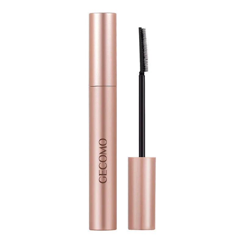 Black women's curly long mascara tube with brush, 14cm height, for lash volumising and definition